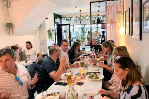 Group enjoying a dining experience on a Walking Food Tour in the UK