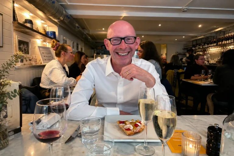 Gareth from Walking Food Tours UK enjoying wine and food during a wine tour experience