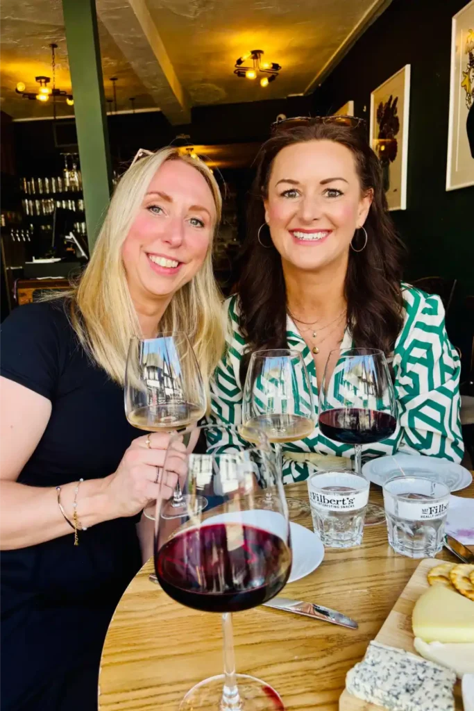 Two guests enjoying wine together on a Liverpool Wine Tour